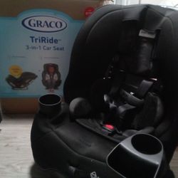 120 Size 2 HUGGIES DIAPERS AND A GRACO 3IN1 TRIRIDE CAR SEAT