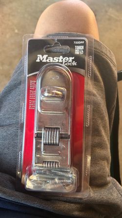 Master Lock 722DPF Double Hinge Hasp, a 7-3/4- .... inch zinc-plated hardened steel security device designed for corners and angles.