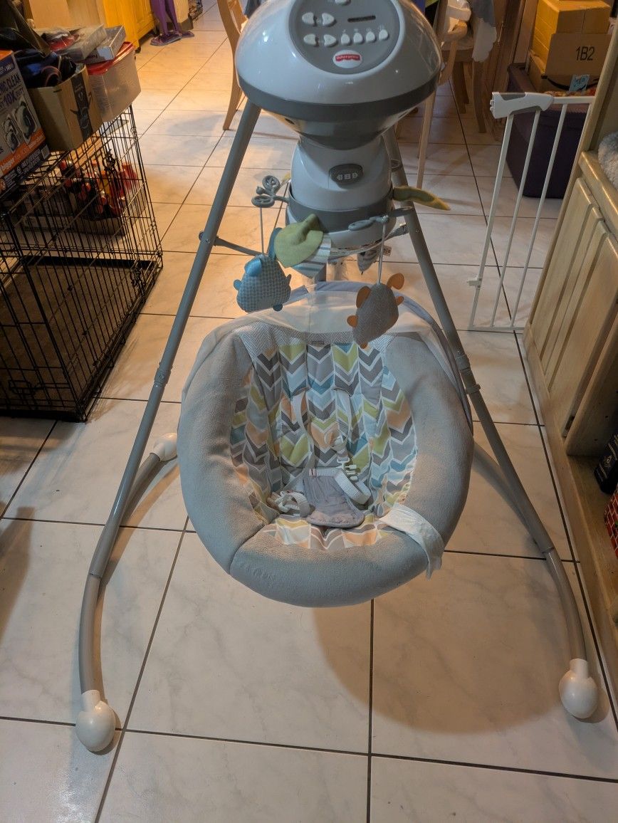 Fisher Price Cradle/Swing. Lullaby Music Turning Mobile