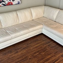 Leather L shape sofa. White