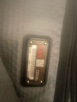 Tumi unisex sling bag
