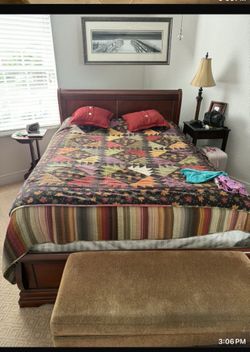 Bed With chair at the bottom and dresser