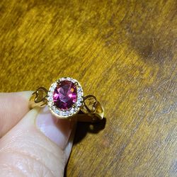 NWOT faux garnet oval halo ring plated estimated size 7.5 #0660 heart details. Cute!