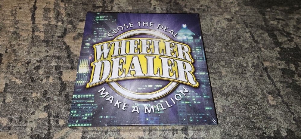 Wheeler Dealer Board Game "Close The Deal Make A Million" Brand New and Sealed!!