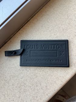 leather tag Louis Vuitton
