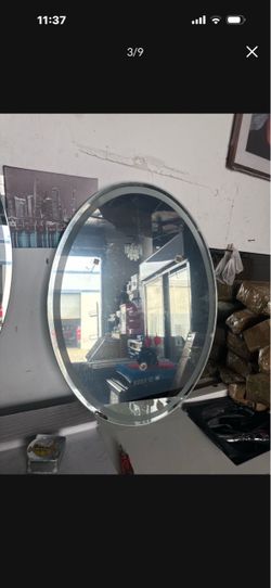 Mirror with standard outlets, has a light, is super cute, It cleans itself with steam. 24”x31” $$new