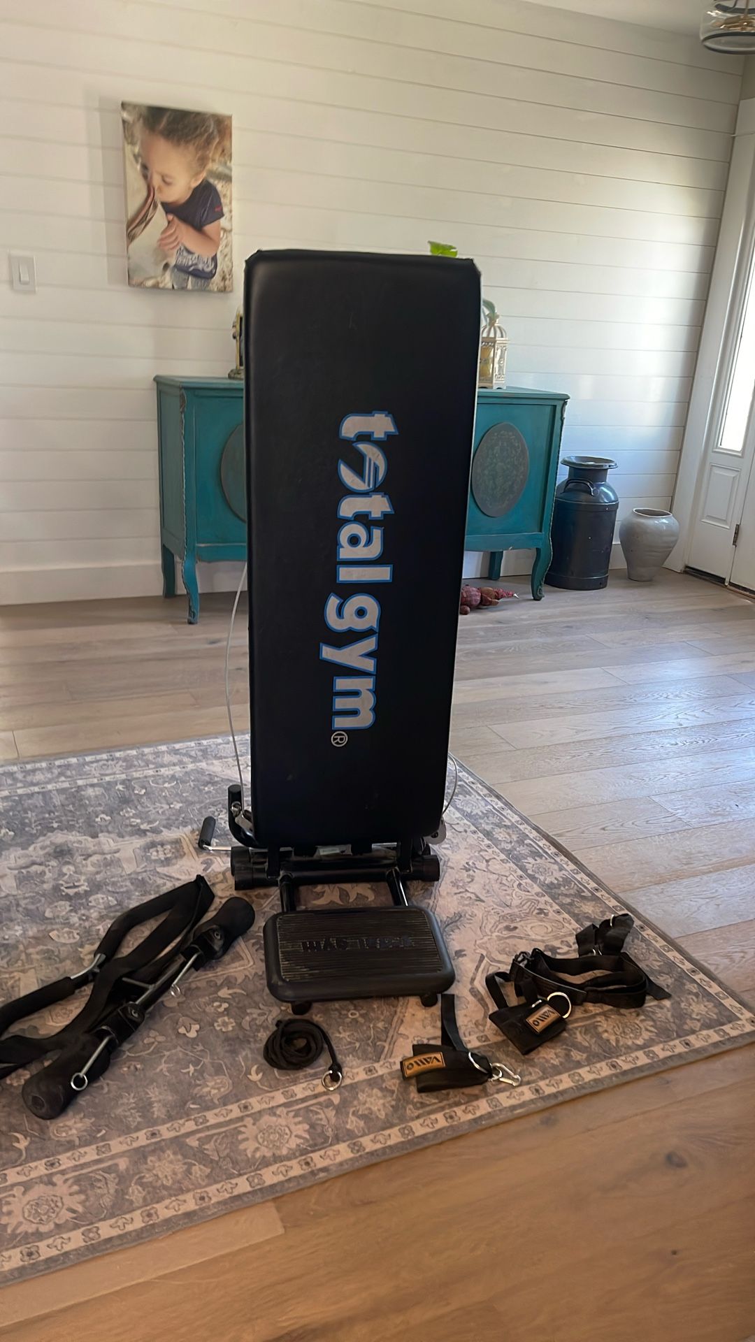 Chuck Norris total gym includes bars and ankle weights