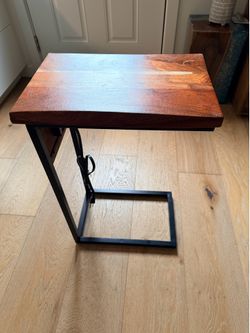 C-Shaped Side Table with a built-in power strip (electrical and USB outlets).