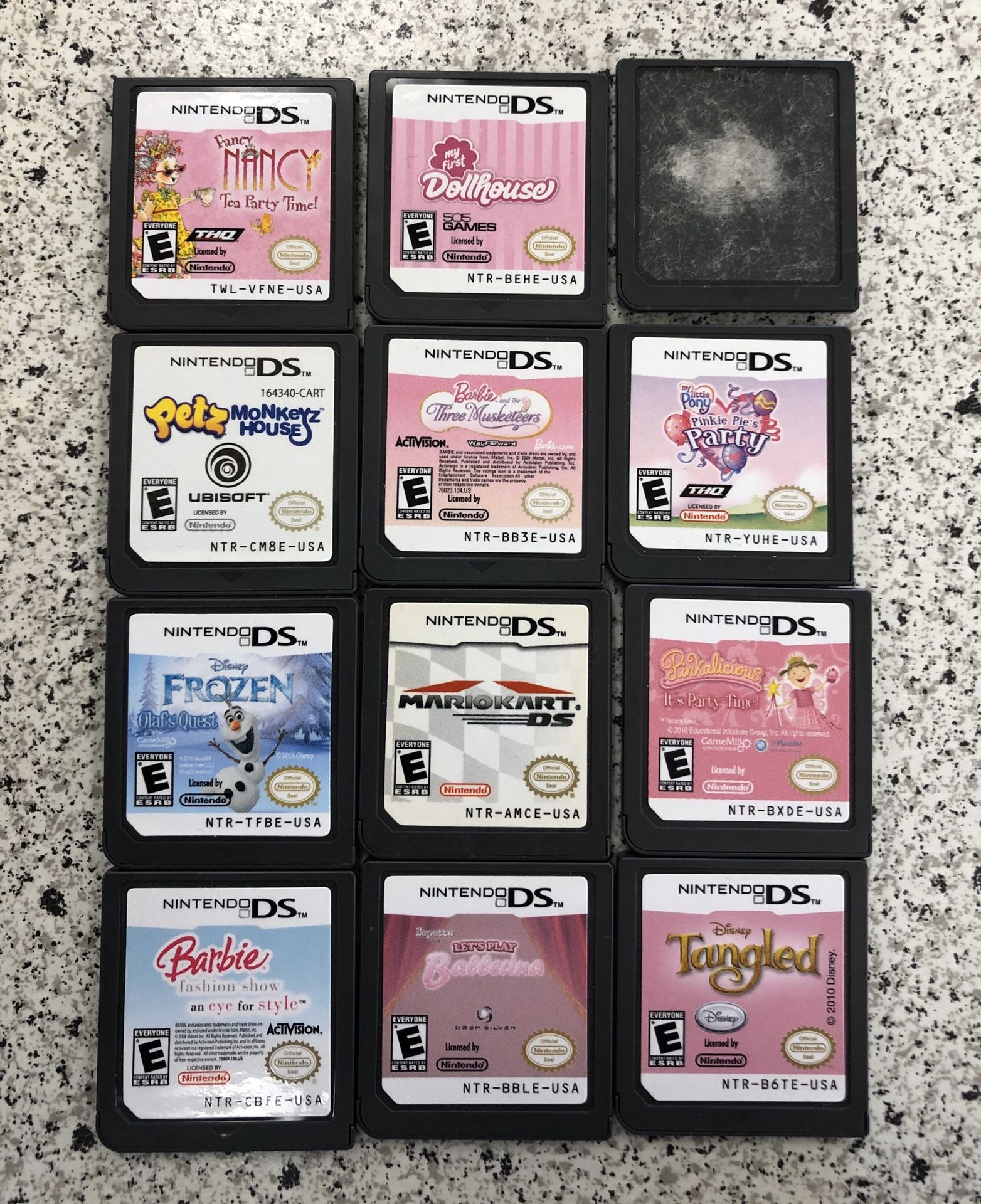 Nintendo DS Games. One without sticker is Nintendogs