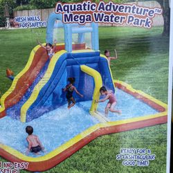 💦🔥 The Aquatic Adventure™ Mega Water Park is the ideal backyard play experience. This inflatable water park features a safe and sturdy water slide, 