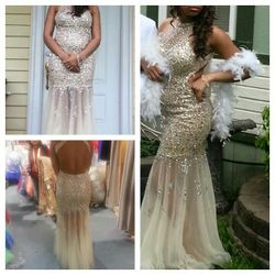 This week only 250 dollars..Beautiful gems and jewls golden beige prom dress..size medium