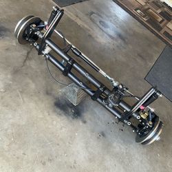 Rebuilt VW bug kingpin beam suspension.  Disk brake, 5x205