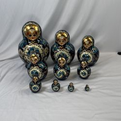 Collectible hand-painted Russian lacquer nesting dolls, 1999, complete set