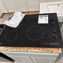 GE 30 in. 4 Burner Element Radiant Electric Cooktop in Black including 2 Power Boil Burners