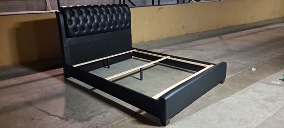 Queen Size Black Ulpostered Bed Frame..