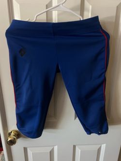 Women’s size small DeMarini royal blue with red piping no belt loop Softball pant.