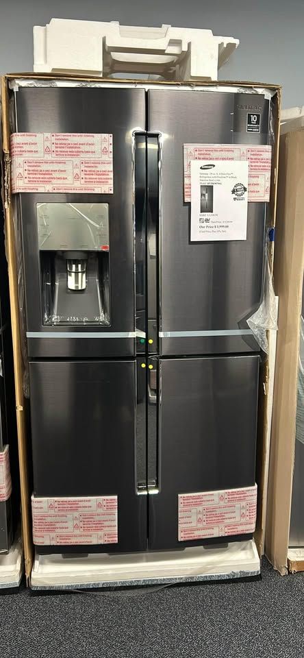 Samsung 28 cu. ft. 4-Door Flexâ„¢ Refrigerator with FlexZoneâ„¢ in Black Stainless Steel