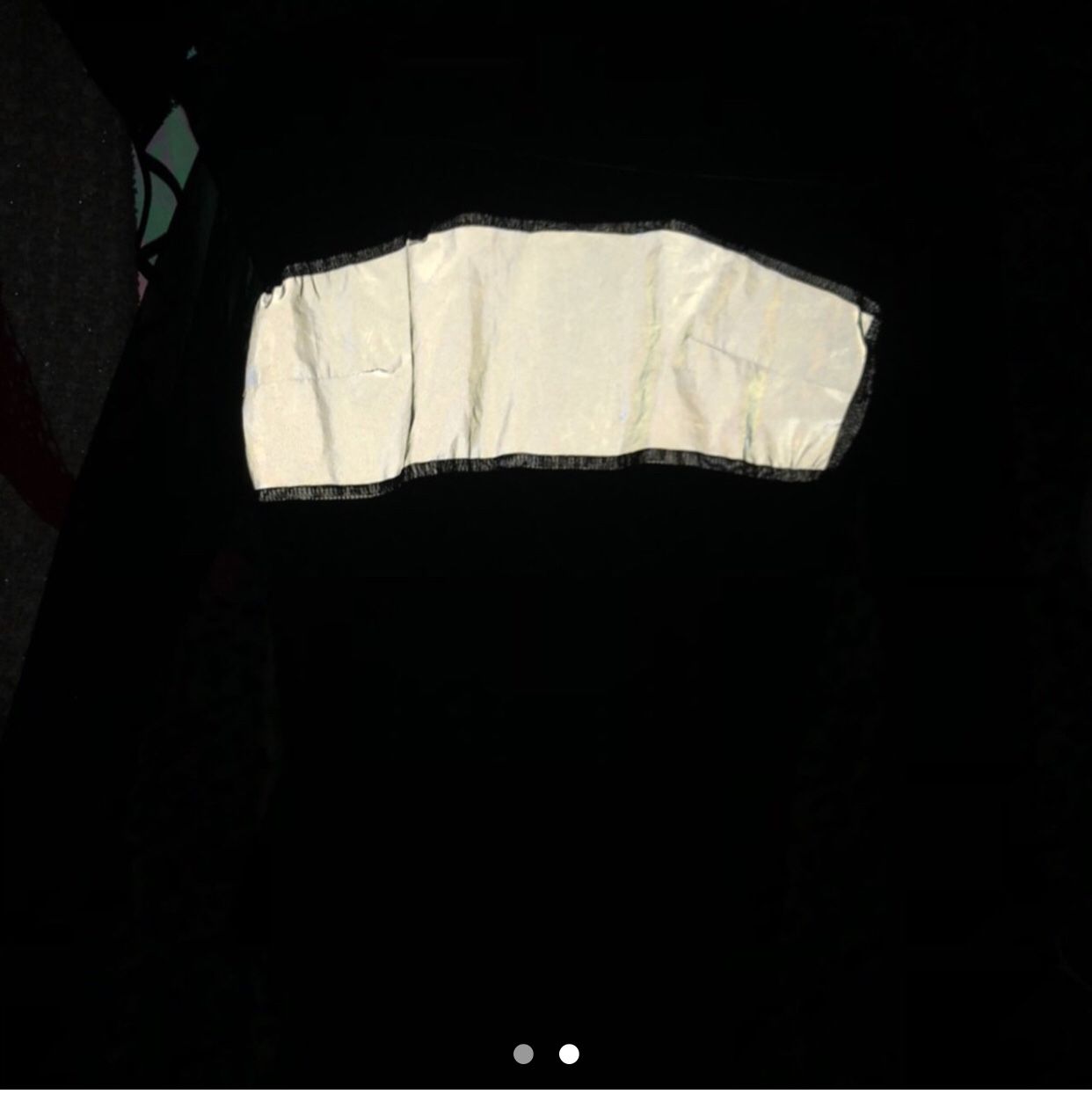 black reflective bodysuit