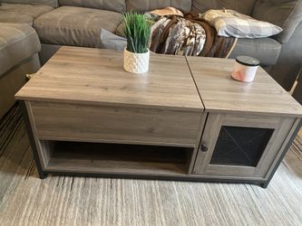 Coffee table with pull up table