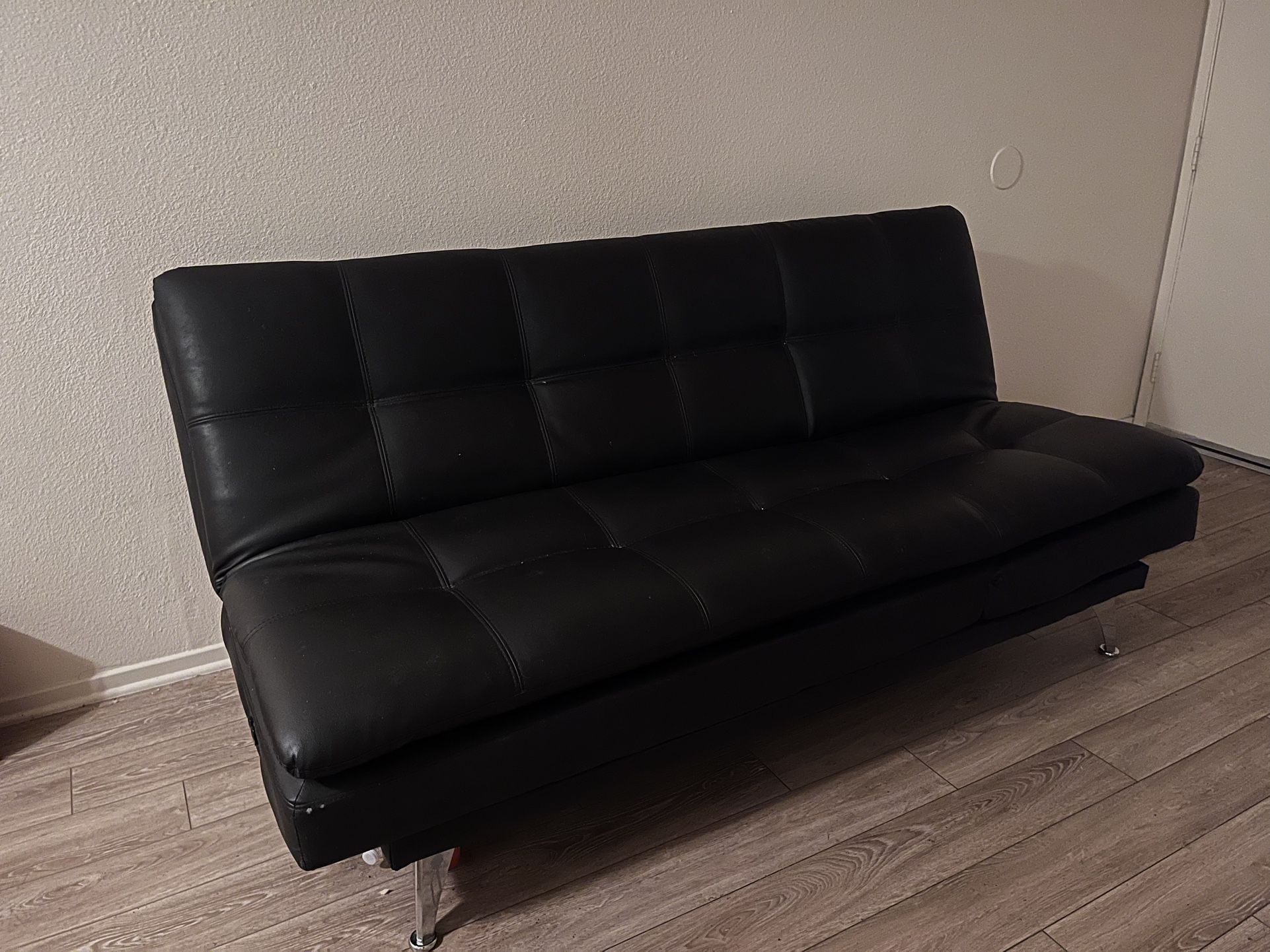 black 3 fold futon with built in charging ports