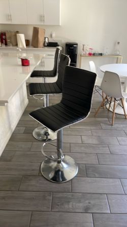 3 black leather barstools
