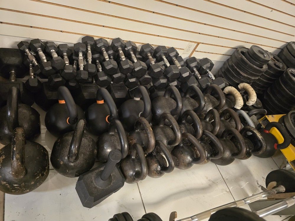 Dumbbells and kettlebells gym equipment exercise fitness workout