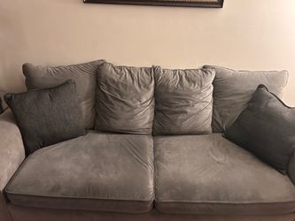 Grey couch for sale Price Negotiable