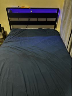 Full size bed with LED