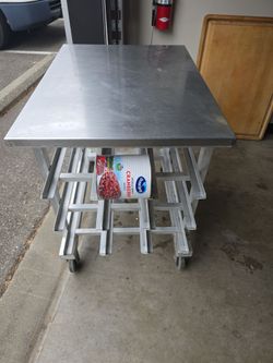 Stainless steel table with #10 can storage