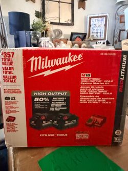 Milwaukee pack of two batteries and charger