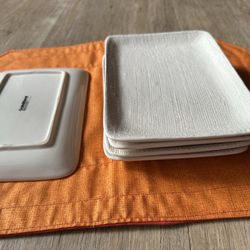 Crate and Barrel - A set of serving plates