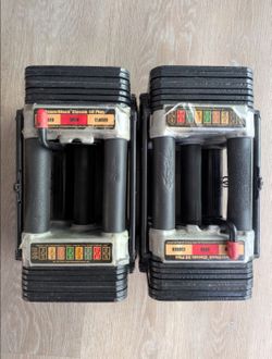 POWERBLOCK ADJUSTABLE DUMBBELLS (2) 50 POUNDERS