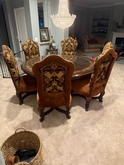 Round Wood Dining Table with 6 Upholstered Chairs