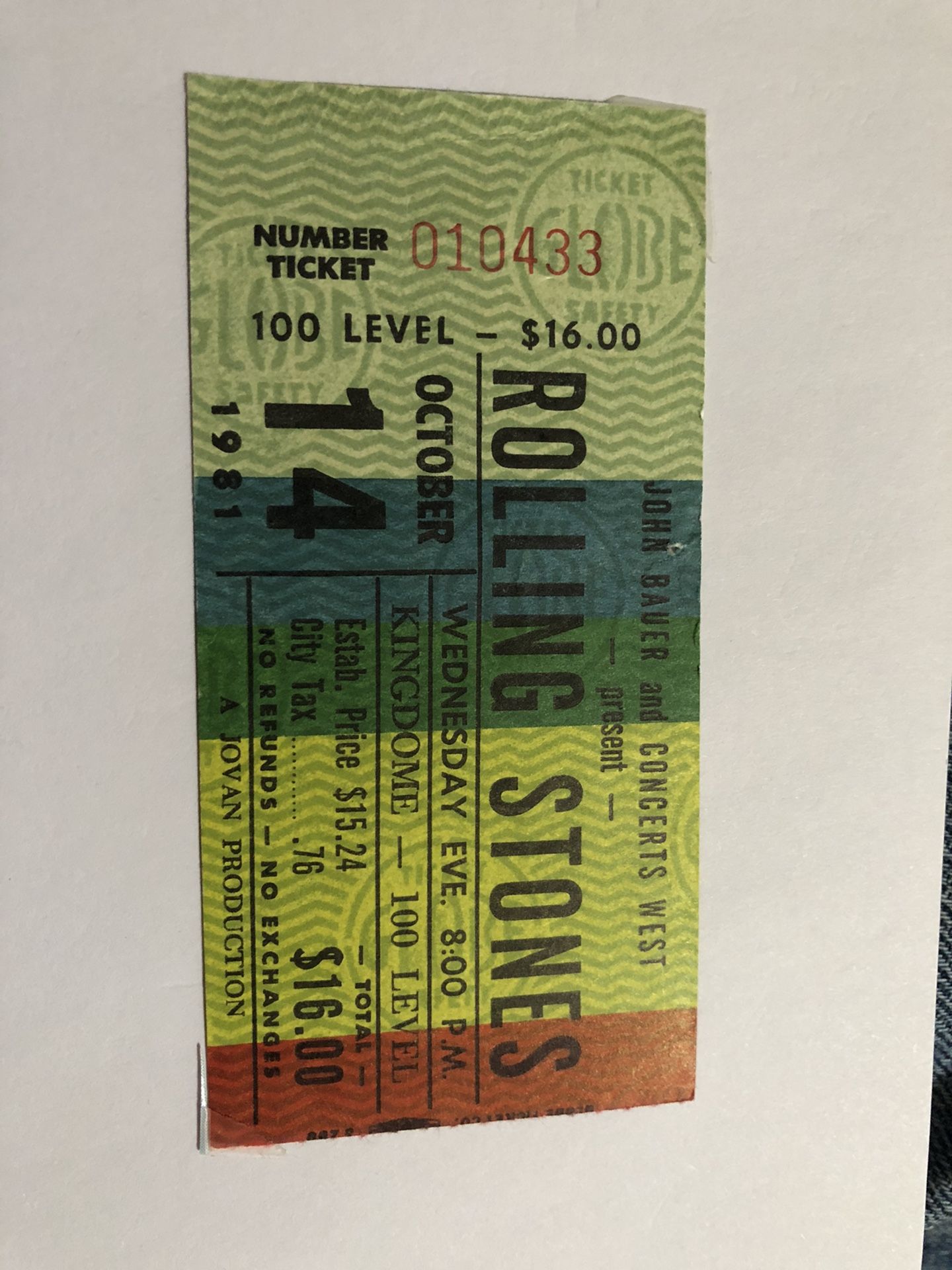 Vintage Rolling Stones concert ticket and brochure.