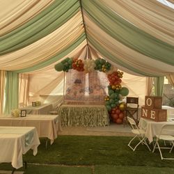 Tent—-draping——tables——chairs——backdrops——
