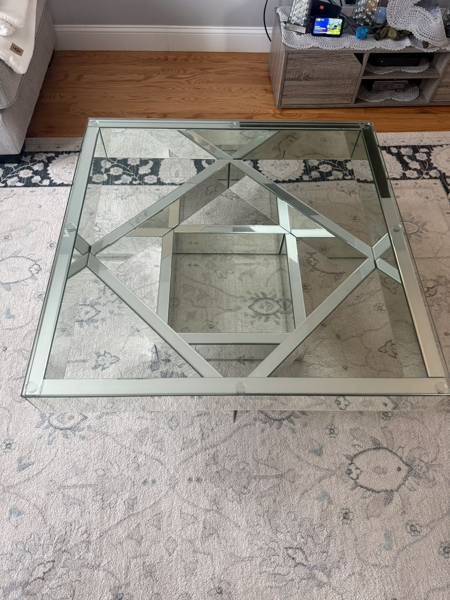 Mirrored Glass Top Coffee Table.