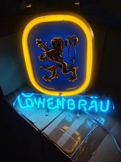 Lowenbrau beer sign, pool room, bar, game room. Or man cave