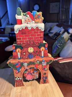 Vintage Jingle Bell Rock Santa Claus Animated Musical Table Top Ornament in very good condition as shown SANTA Goes Up And Down the Chimney 12" TALL