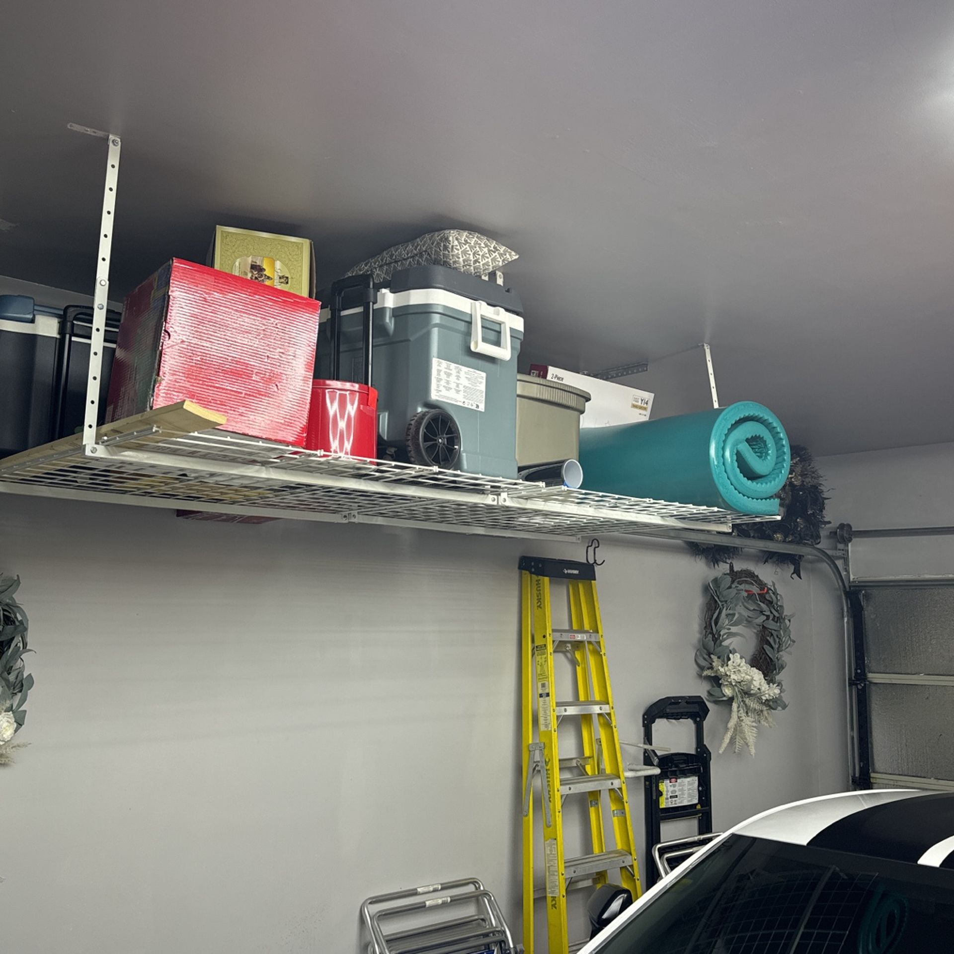 Garage ceiling shelves, ceiling fan