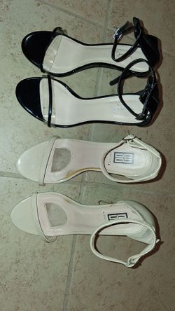 1pr of women's tan colored heels, and 1 black colored heels, both size 6