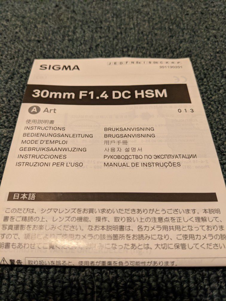 Sigma 30mm F/1.4 Owner's Manual