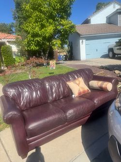 Burgundy leather couches