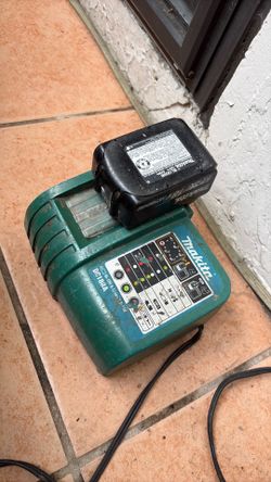 18V makita battery charger and 18V- 3.0 Ah battery