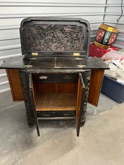 Chinese wood carved liquor cabinet