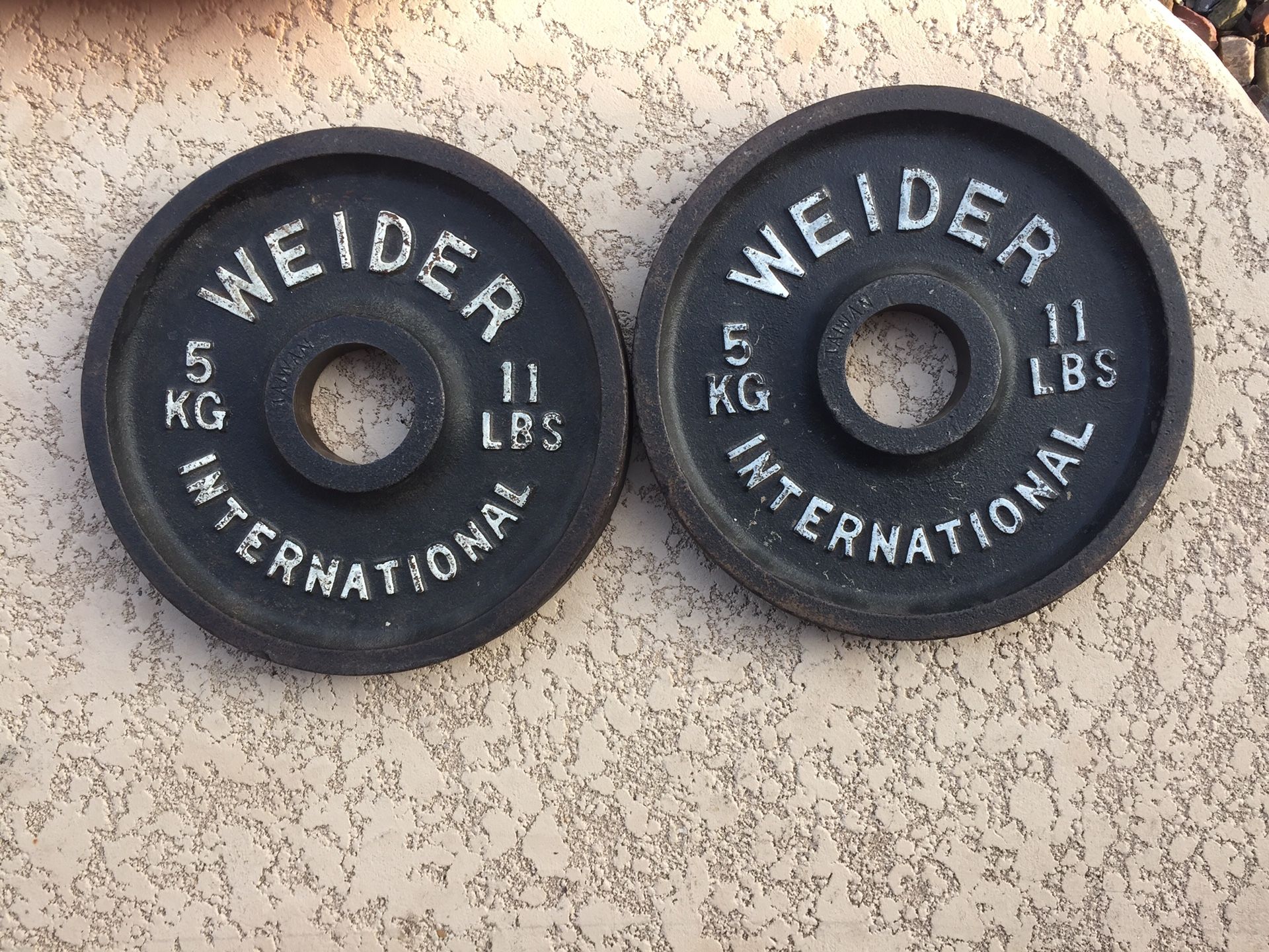 A Pair of 11 Ibs Olympic Weight Plates Very Nice