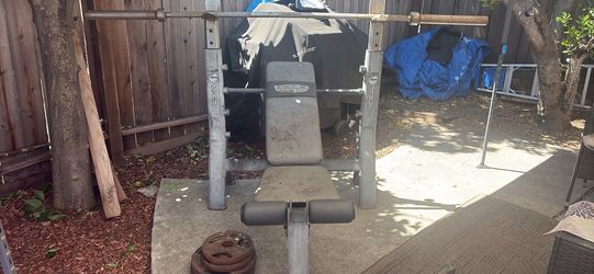 Bench with bar and weights