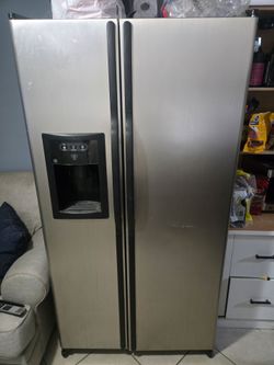 GE Side-by-Side Refrigerator with Ice and Water Dispenser
