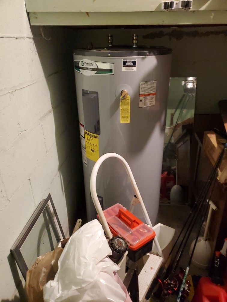 Hot Water Tank, Range, Washer, Dryer 