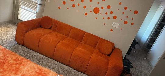 Large comfy orange couch
