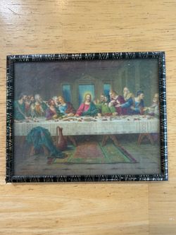 print of The Last Supper. Frame has rust on it